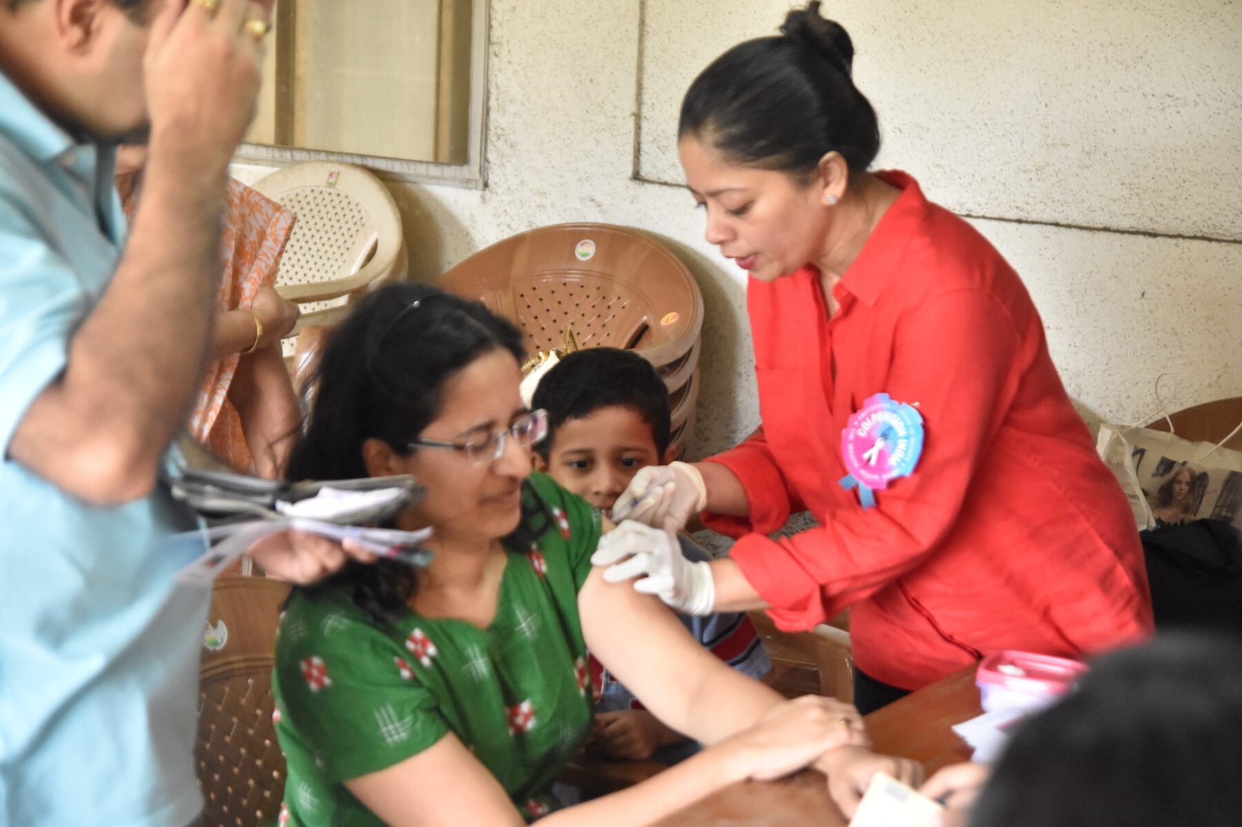 HPV vaccination being administered at a Colpovision India community camp